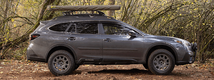 Subaru Outback in the woods