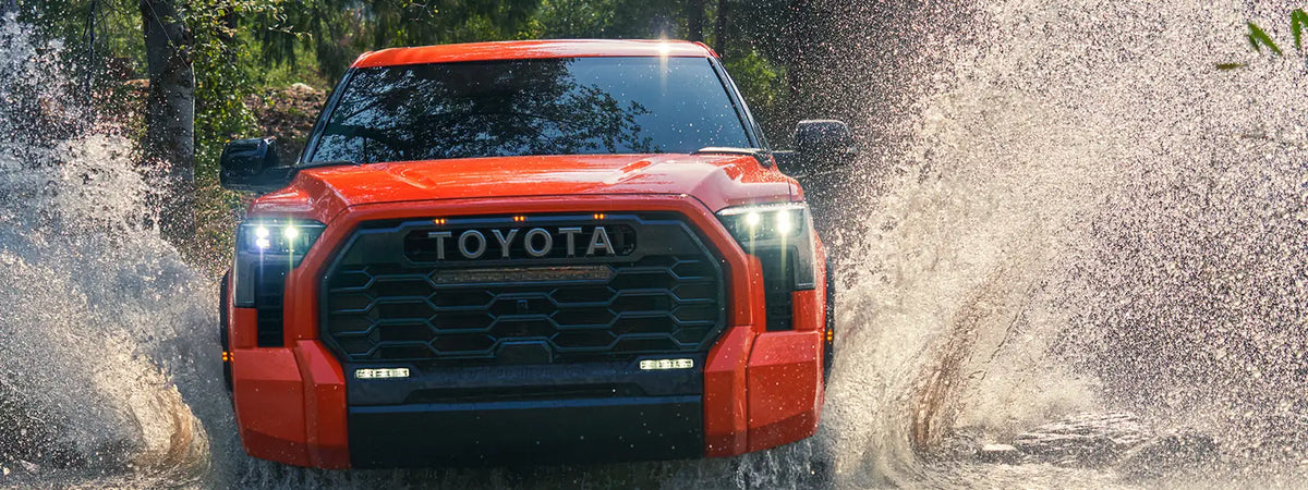 New Tundra splashing through stream