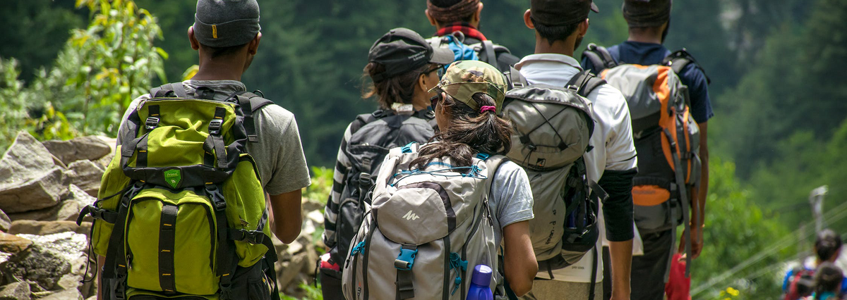 Group of hikers on a wooded trail