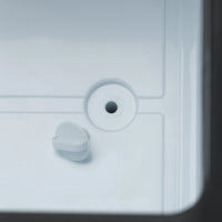 Close-up of a white plastic component with a circular hole and a smaller protrusion on a light gray background.