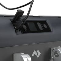 Close-up of a portable outdoor fridge USB charging port with digital control panel