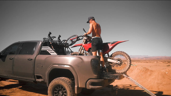 loading moto onto back of truck
