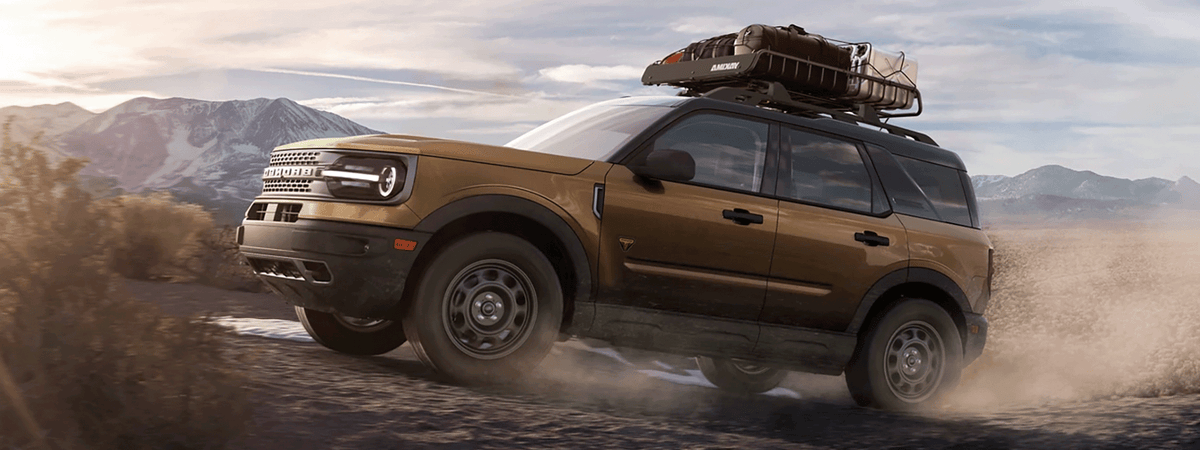 Ford Bronco Sport with roof-mounted awning and cargo loaded for a camping trip