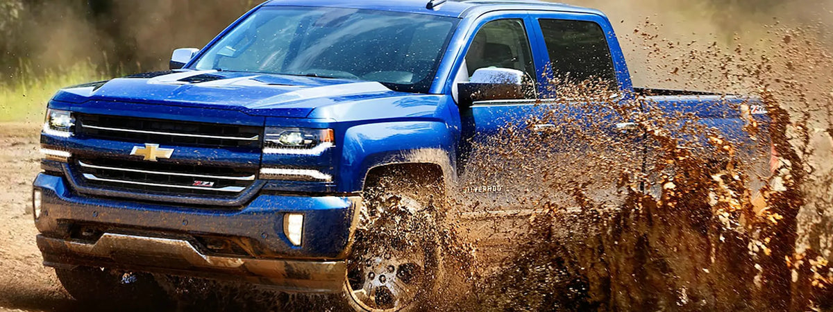 Chevy Silverado in the mud