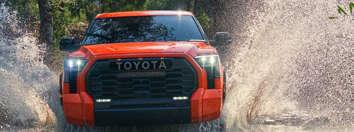 New Tundra splashing through stream