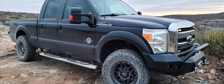 F-250 with bull-bar and rock sliders