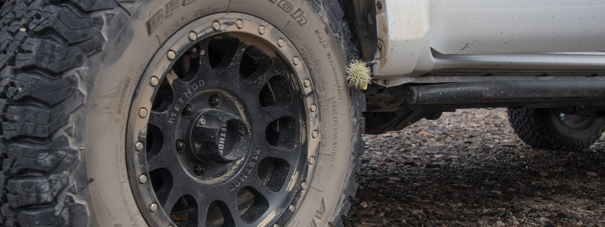 Truck winch bumper and rock sliders on a trail-ready build