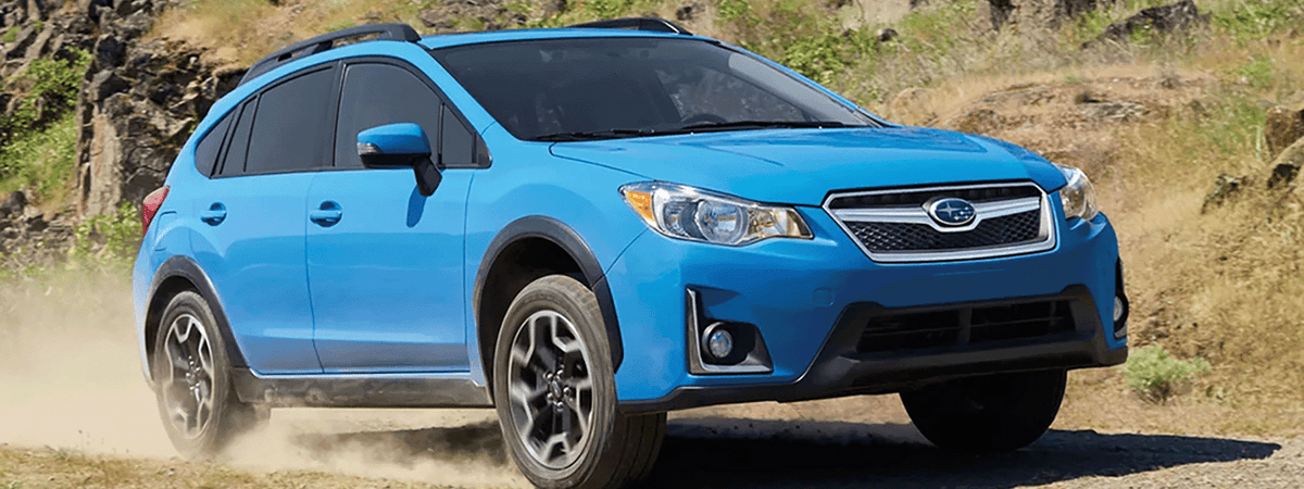 2013 to 2017 Subaru Crosstrek XV with roof rack on forest service road