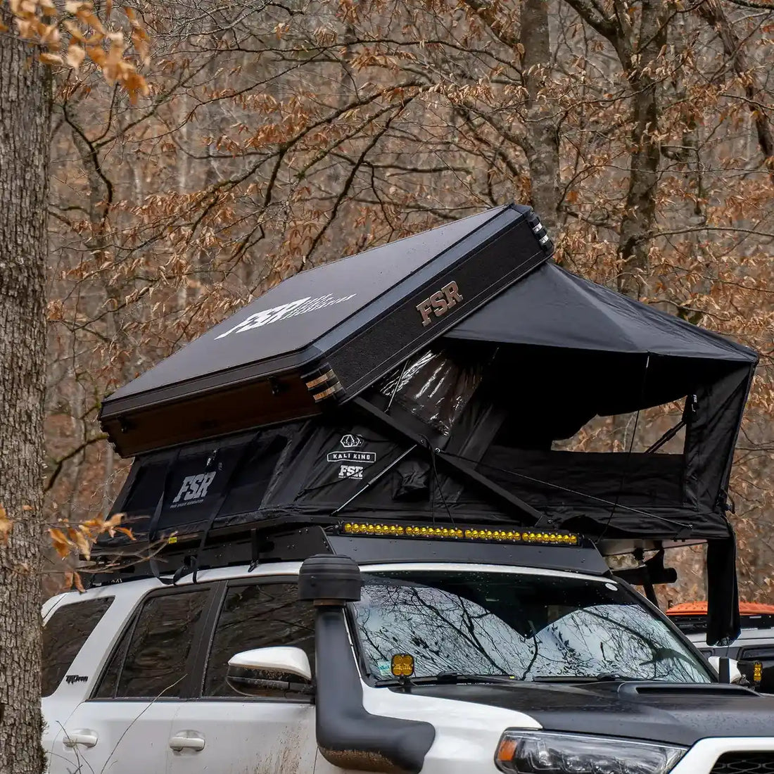 Free Spirit Kali King rooftop tent in use at a campsite