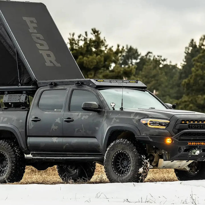 Free Spirit Aspen Lite XL rooftop tent in use at camp
