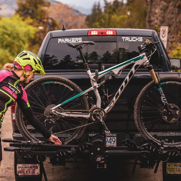 Quad 2+2 padded ratchet hooks and wheel trays on a hitch rack