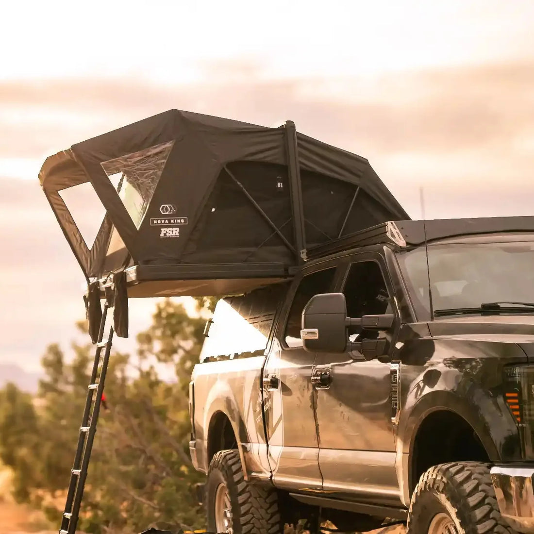 Ford Super Duty with Free Spirit Nova King rooftop tent at camp