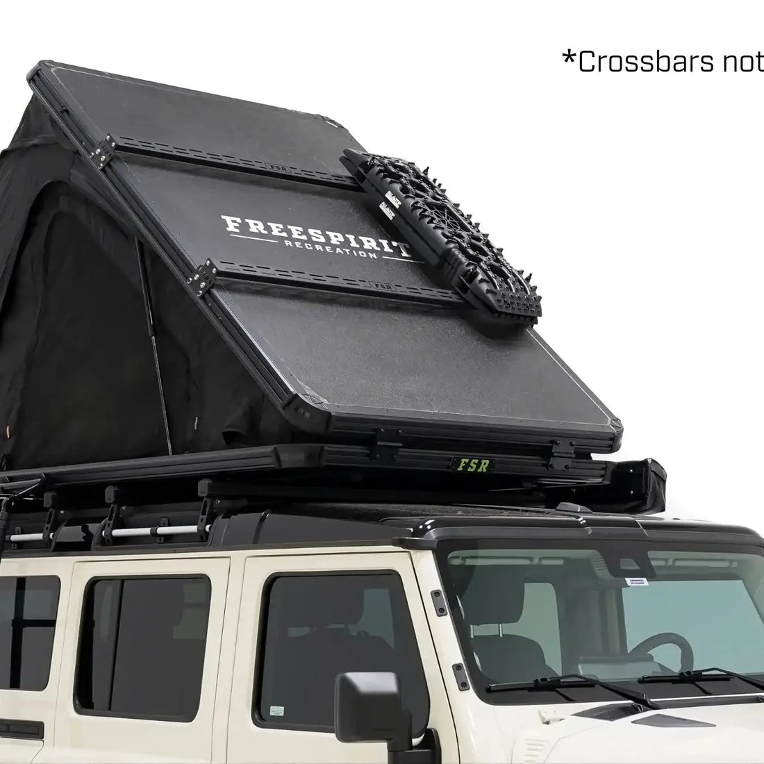 Free Spirit Aspen Pro XL hard shell rooftop tent open on an Ineos Grenadier
