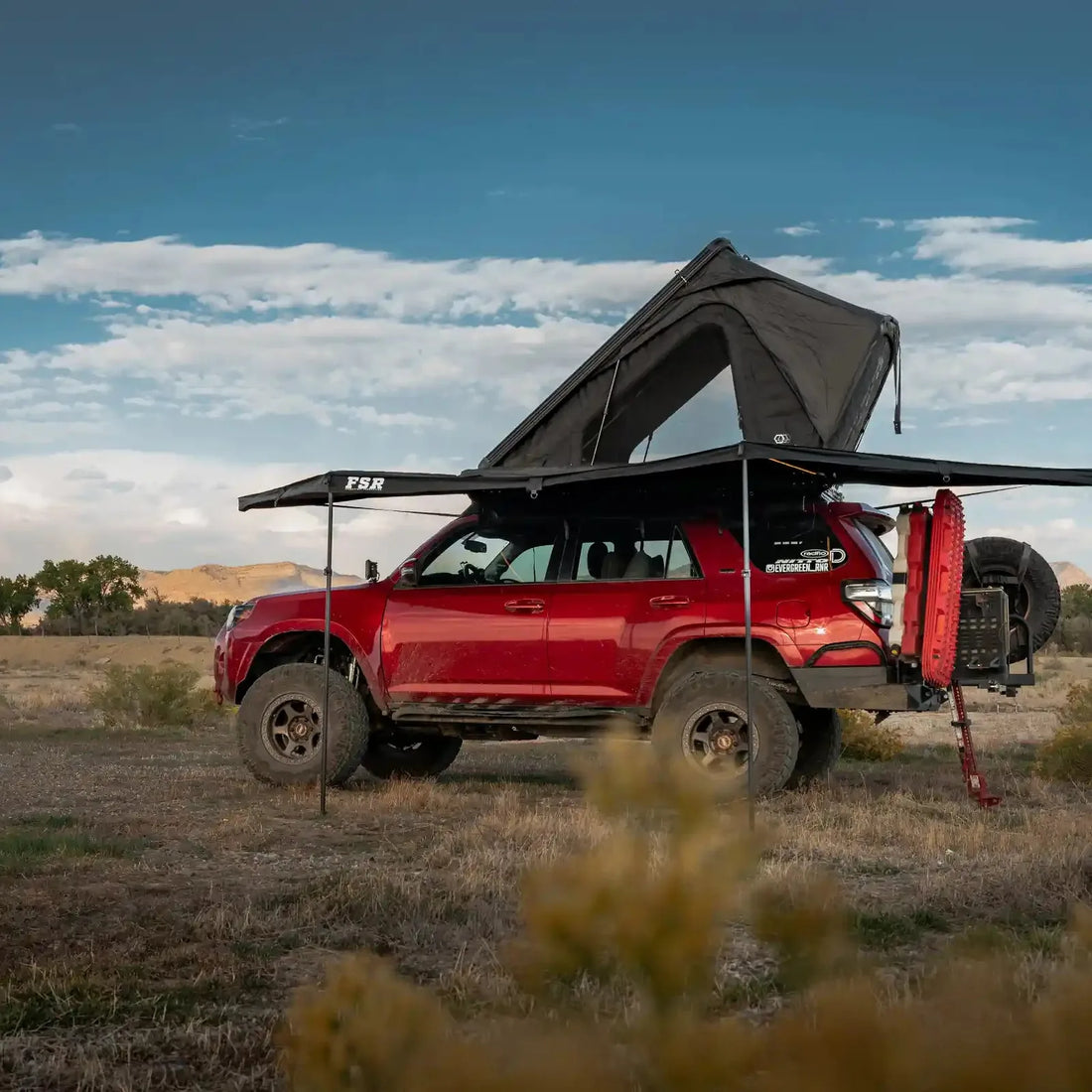 Red 4Runner with Free Spirit 180 Awning V2 deployed