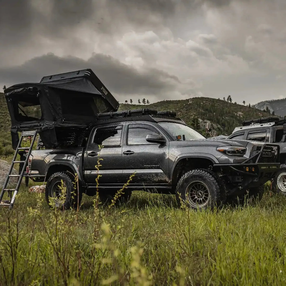 Tacoma with Free Spirit Kali rooftop tent overlooking mountain landscape