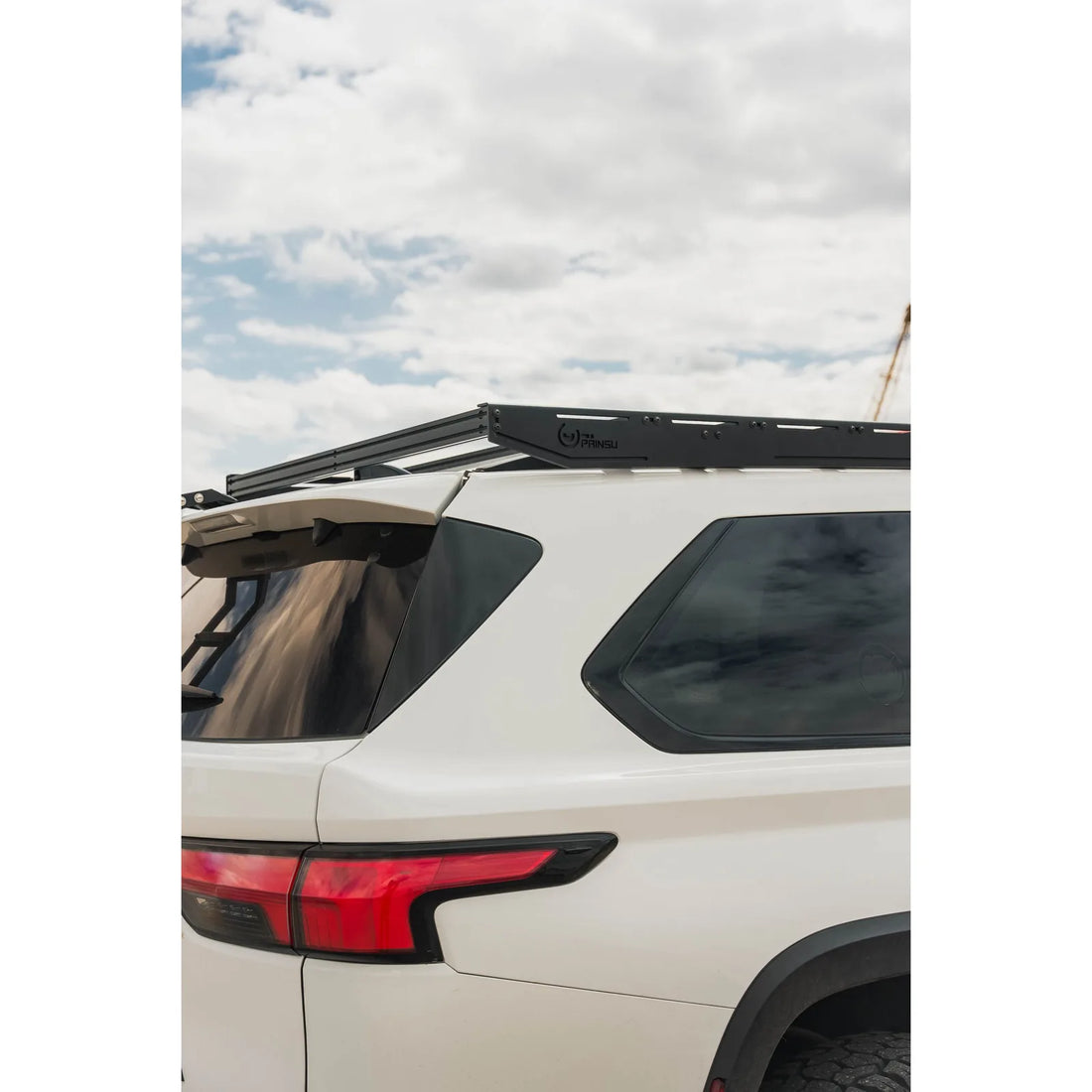 Rear three-quarter of Sequoia with Prinsu Pro roof platform