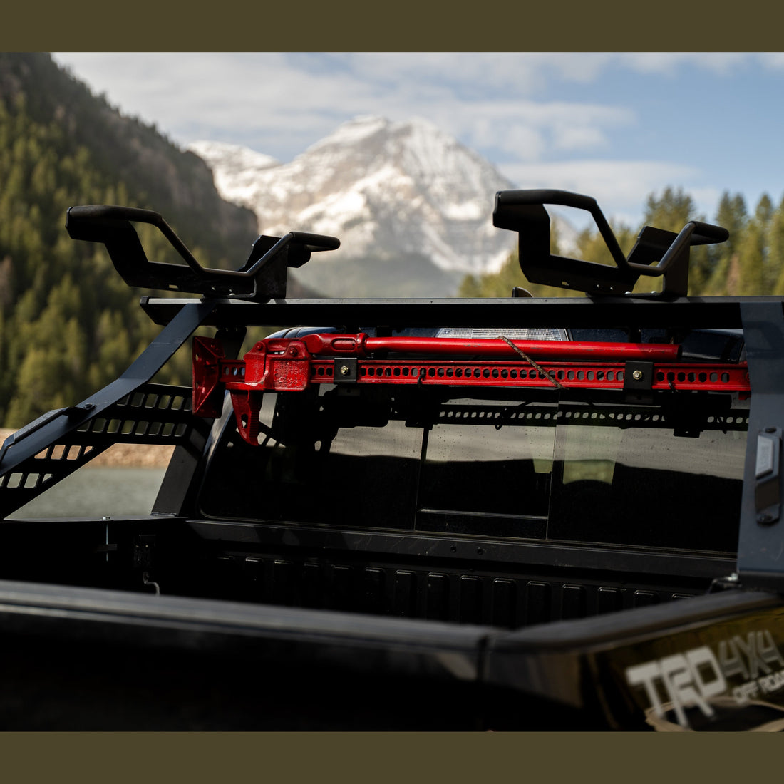 Chase Rack with Hi-Lift mount and other T-track add-ons in a truck bed