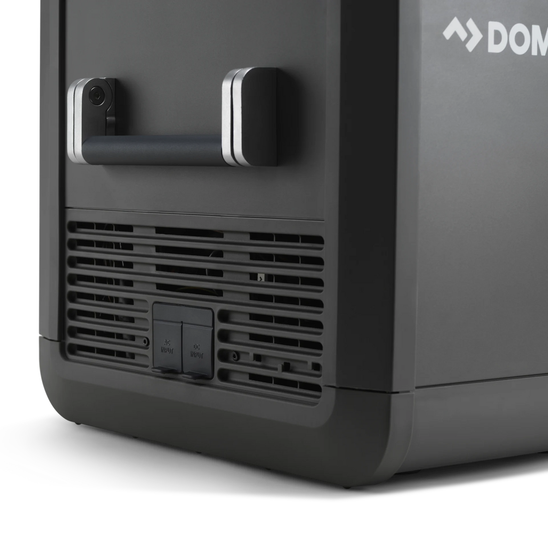 Close-up of a portable outdoor fridge with handle and dual AC/DC power inputs