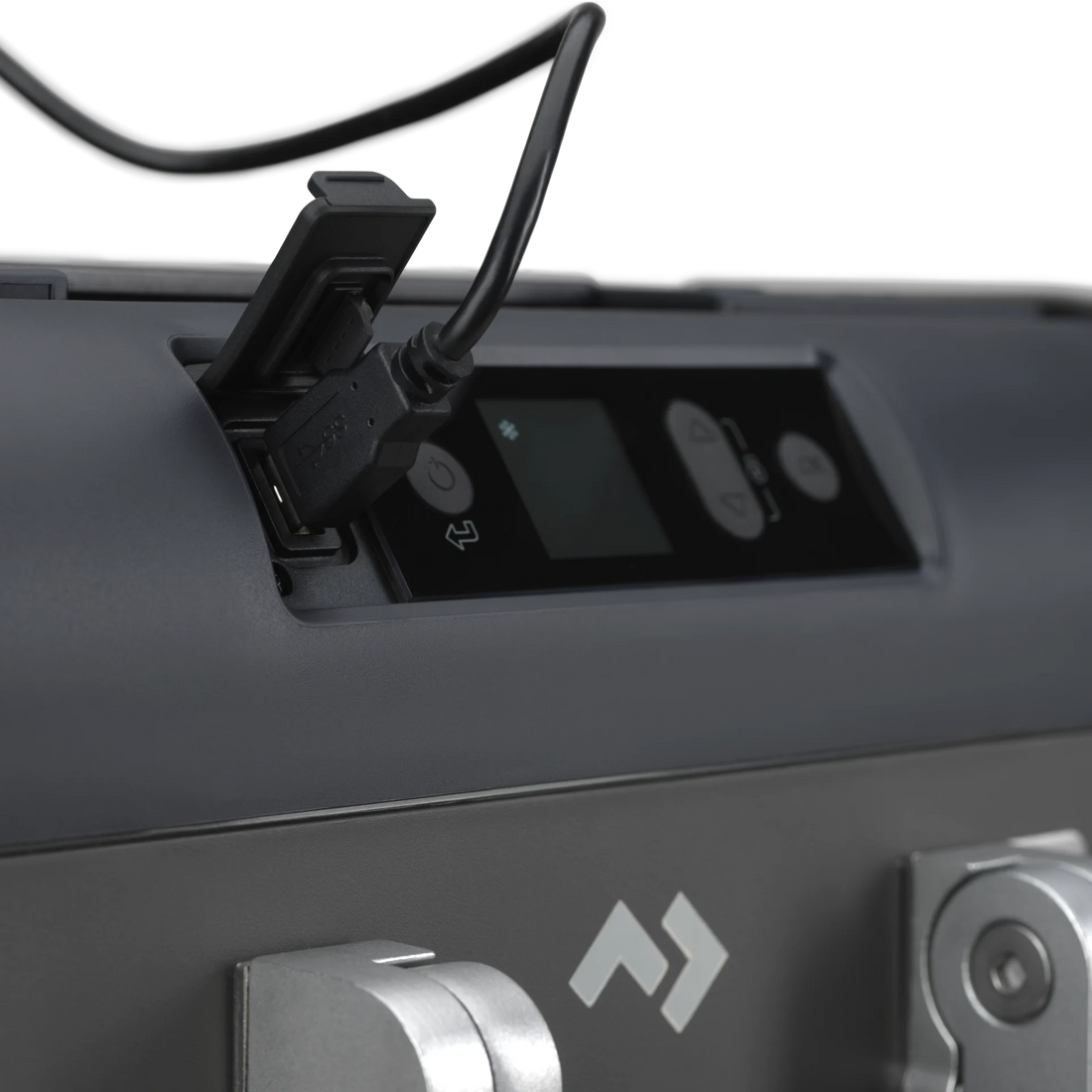 Close-up of portable outdoor fridge control panel with USB port and latch