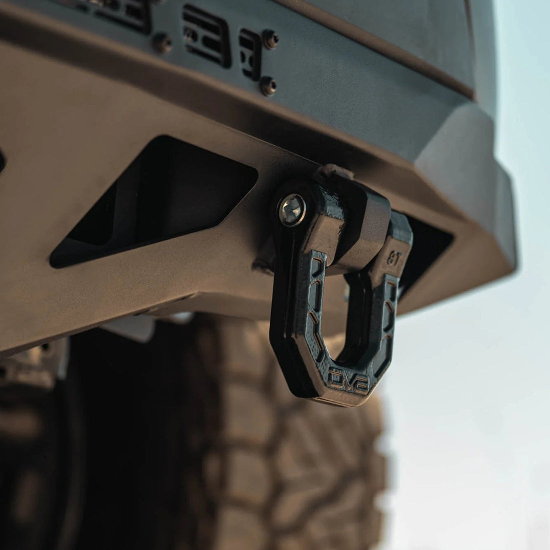 Close-up of a carabiner attached to a vehicle&