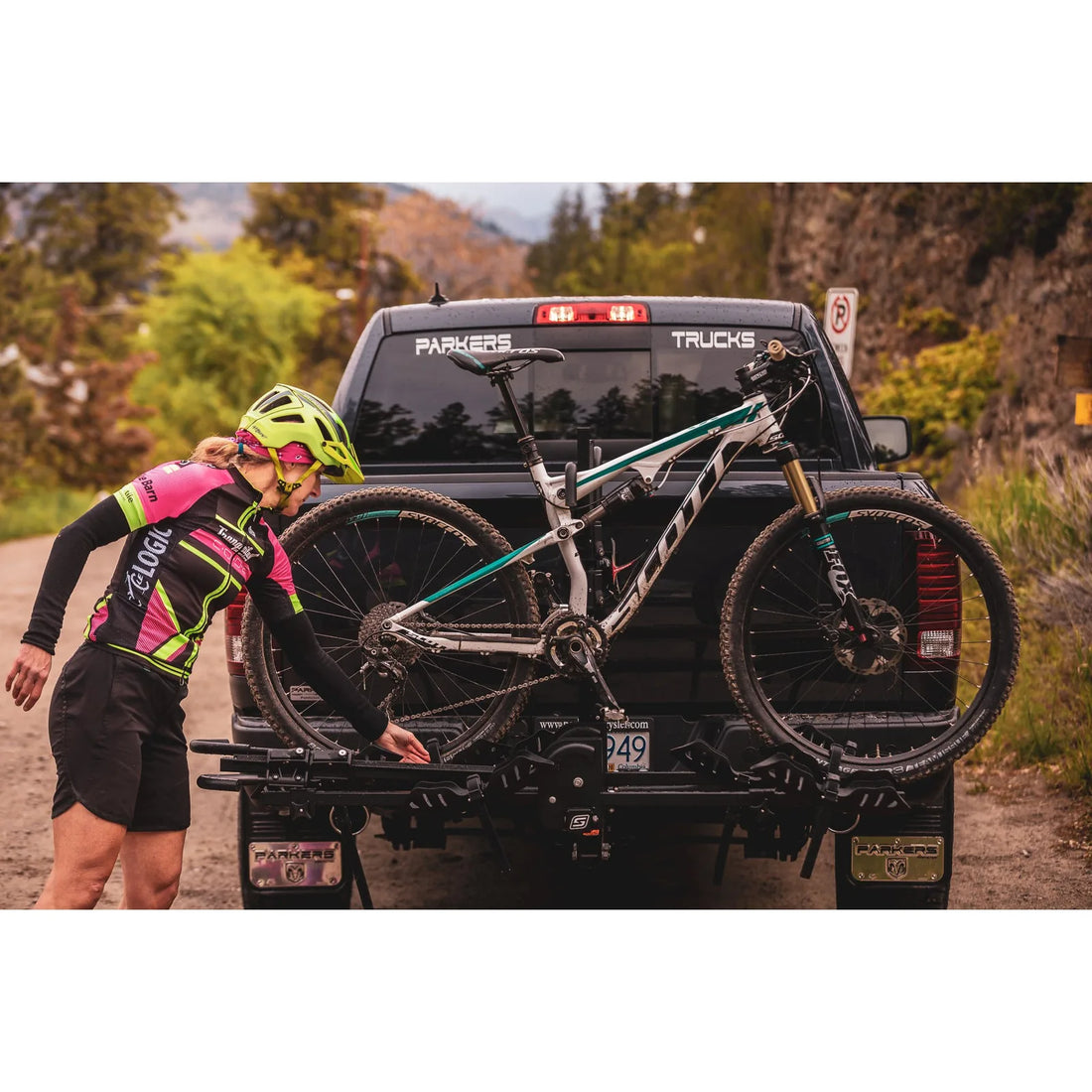 Quad 2+2 padded ratchet hooks and wheel trays on a hitch rack