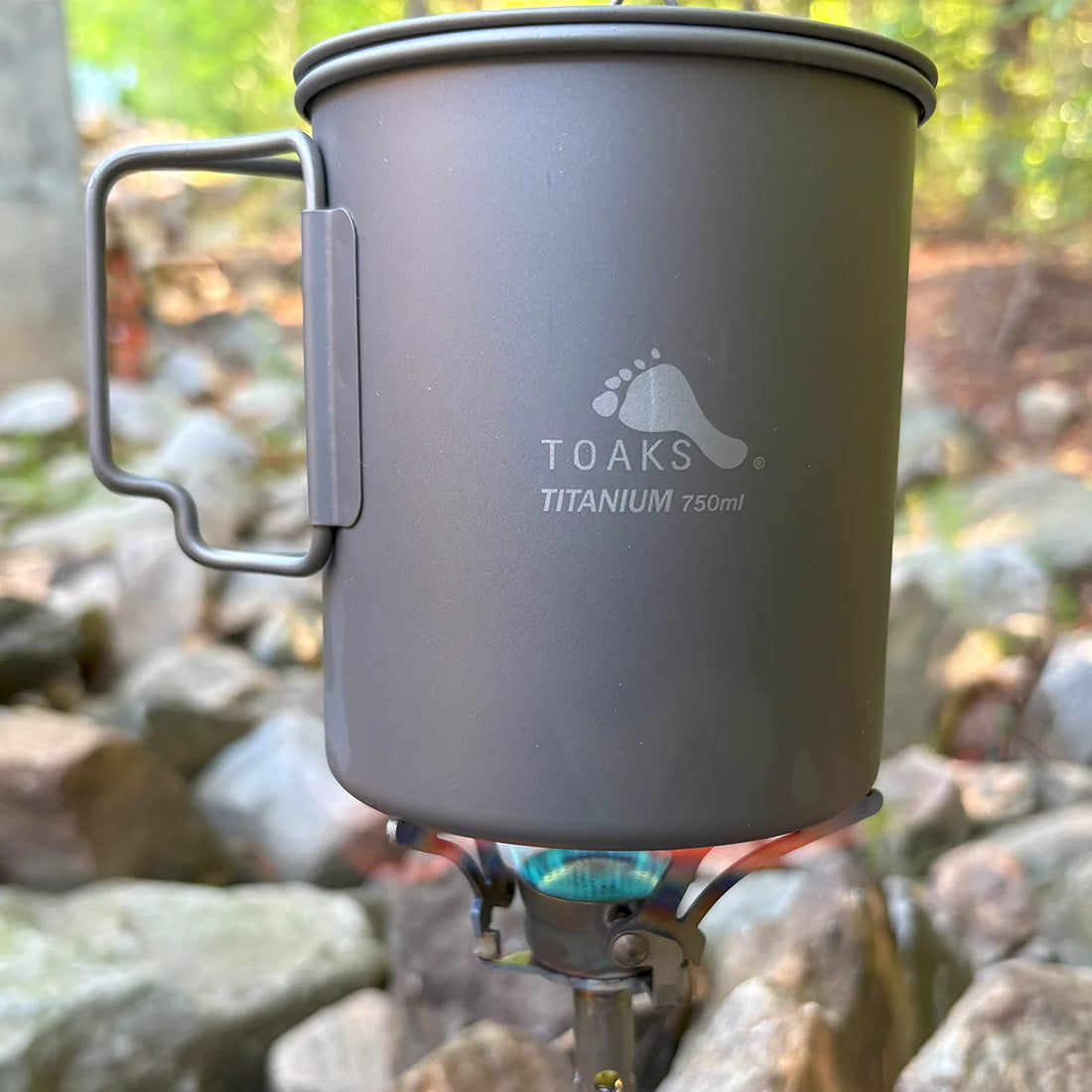 titanium cup on top of stove