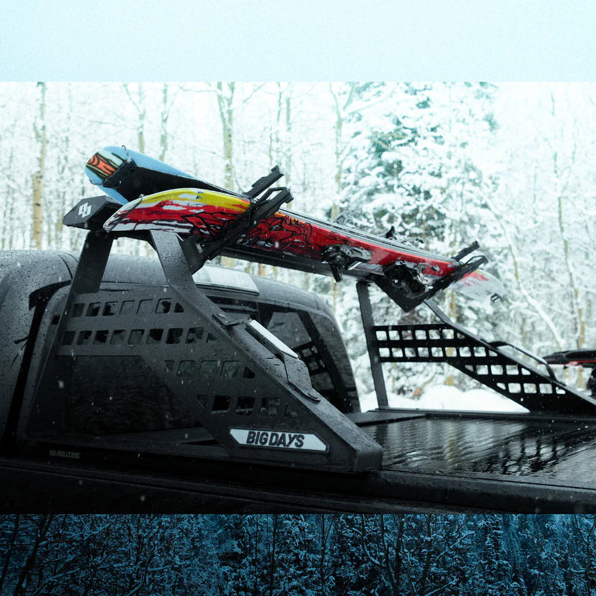 Futuristic vehicle on a snowy landscape with trees in the background