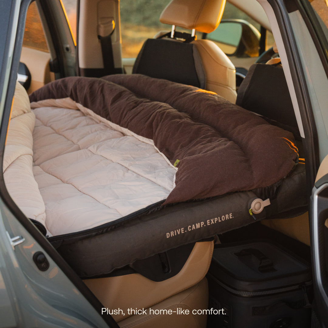 Inflatable car mattress in a vehicle with &