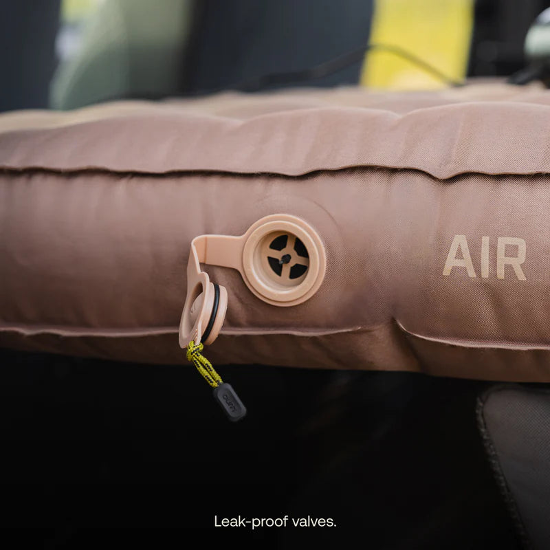 Inflatable air pillow with leak-proof valve on a dark background