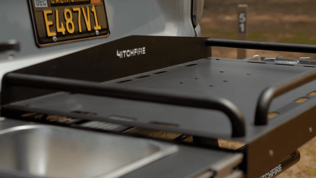 Black HitchFire vehicle accessory on a truck with a blurred background