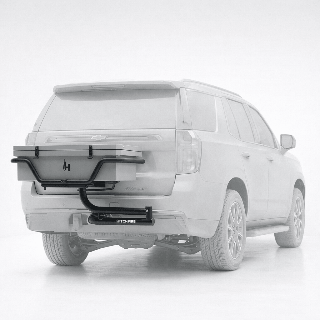 White SUV with a HitchFire product attached to the rear bumper on a white background