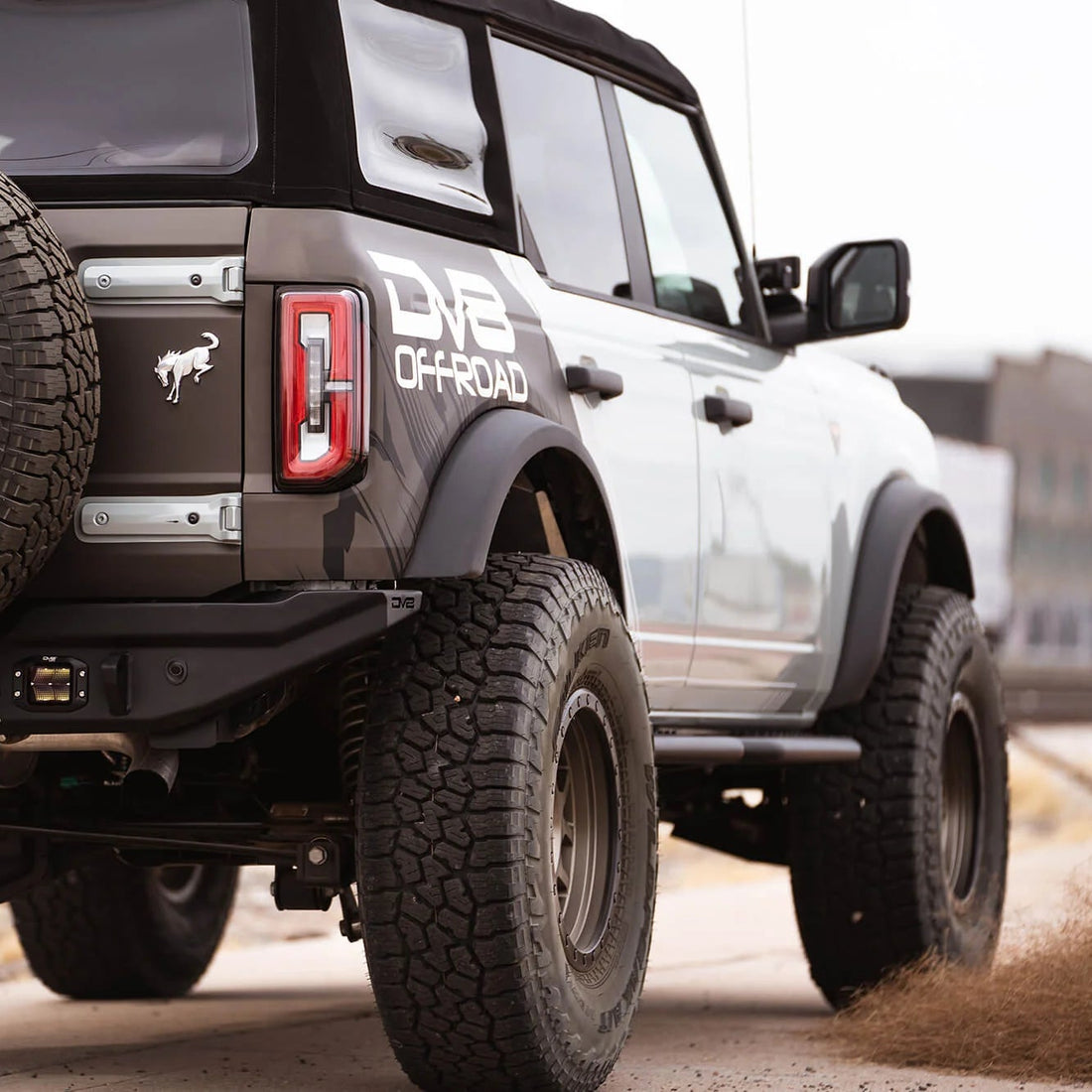 Off-road Bronco on a dirt road with &