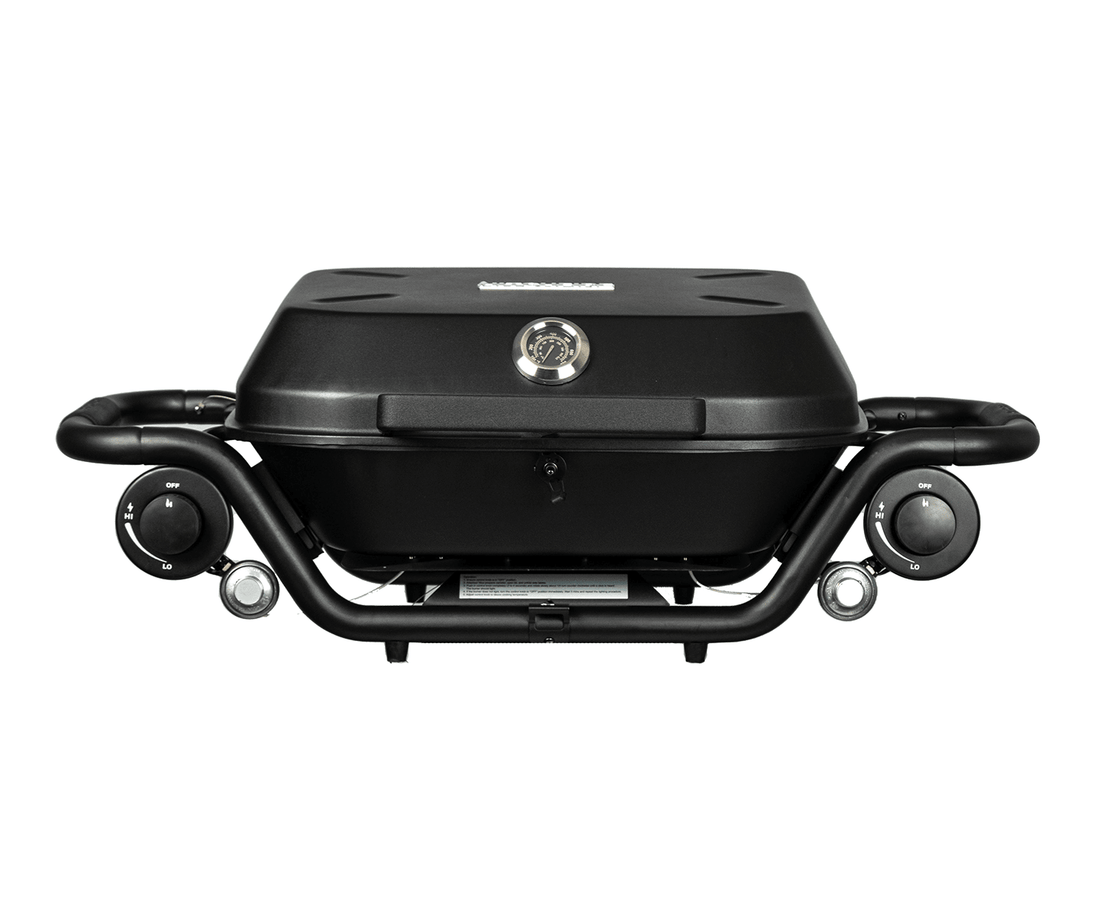 Black portable grill on a white background