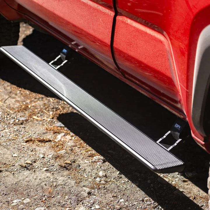 BODYARMOR4x4 E-Power board step deployed on a red Toyota 4Runner