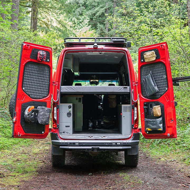 Flatline Van Co. MOLLE panels installed on open Sprinter rear doors