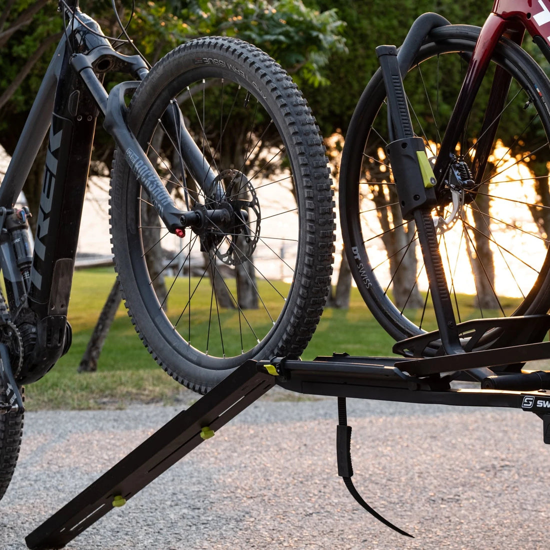 Swagman ramp and bridge with a bike rolling up onto a Skaha hitch rack