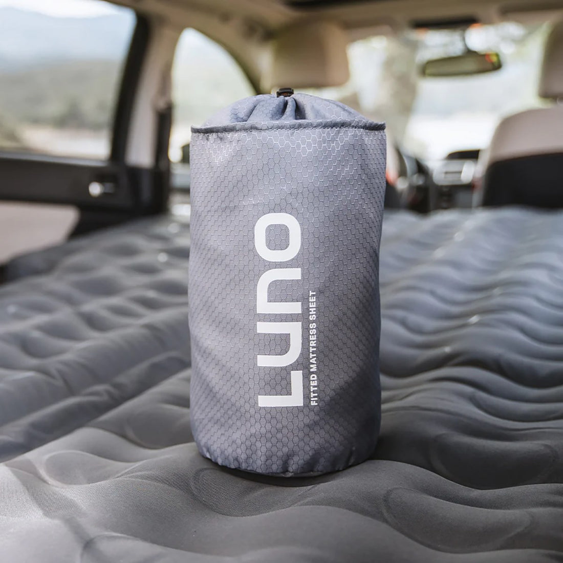 Luno fitted sheet on a compact or mid-size SUV vehicle mattress, view 8