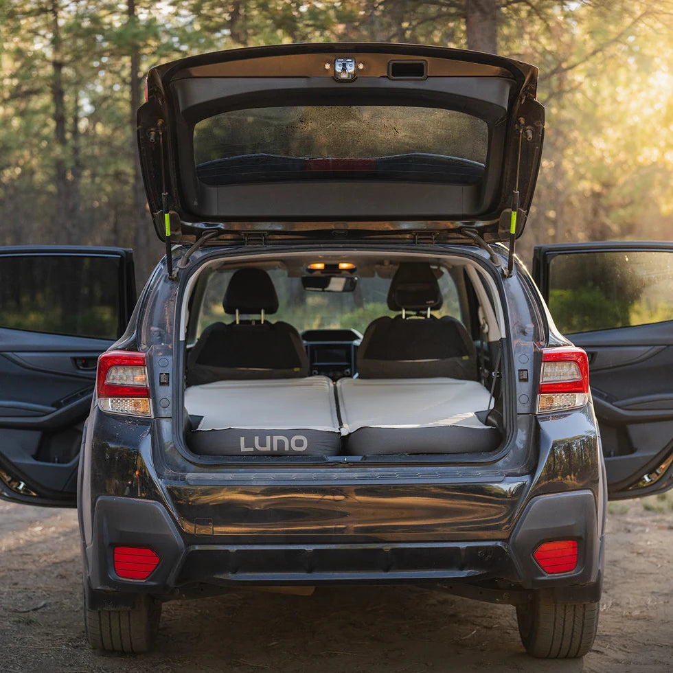Luno AIR+FOAM Pro mattress in the cargo area of a Subaru Crosstrek with the rear hatch open