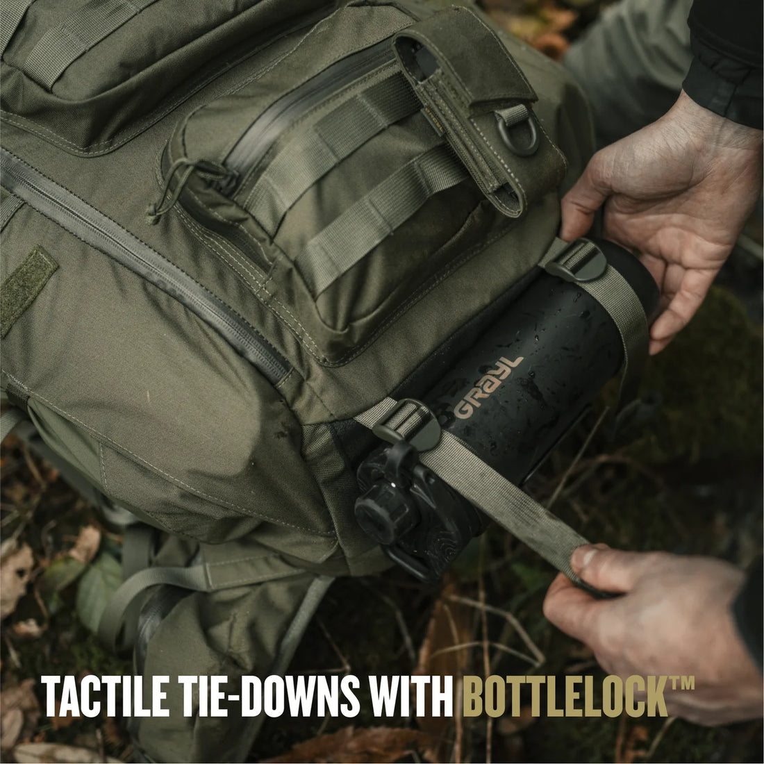 BottleLock tie-down holding a bottle on the Mission EXP Backpack
