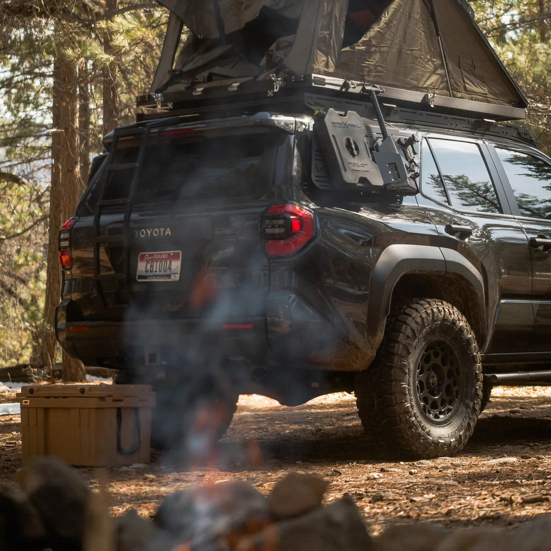 6th Gen Toyota 4Runner with Prinsu ladder and rooftop tent at camp