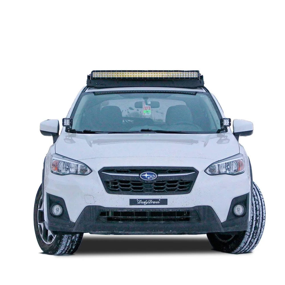 Front view of a Subaru Crosstrek with Prinsu roof rack and light bar