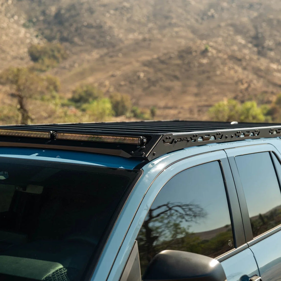 DV8 light fairing on a 4Runner roof rack, close-up