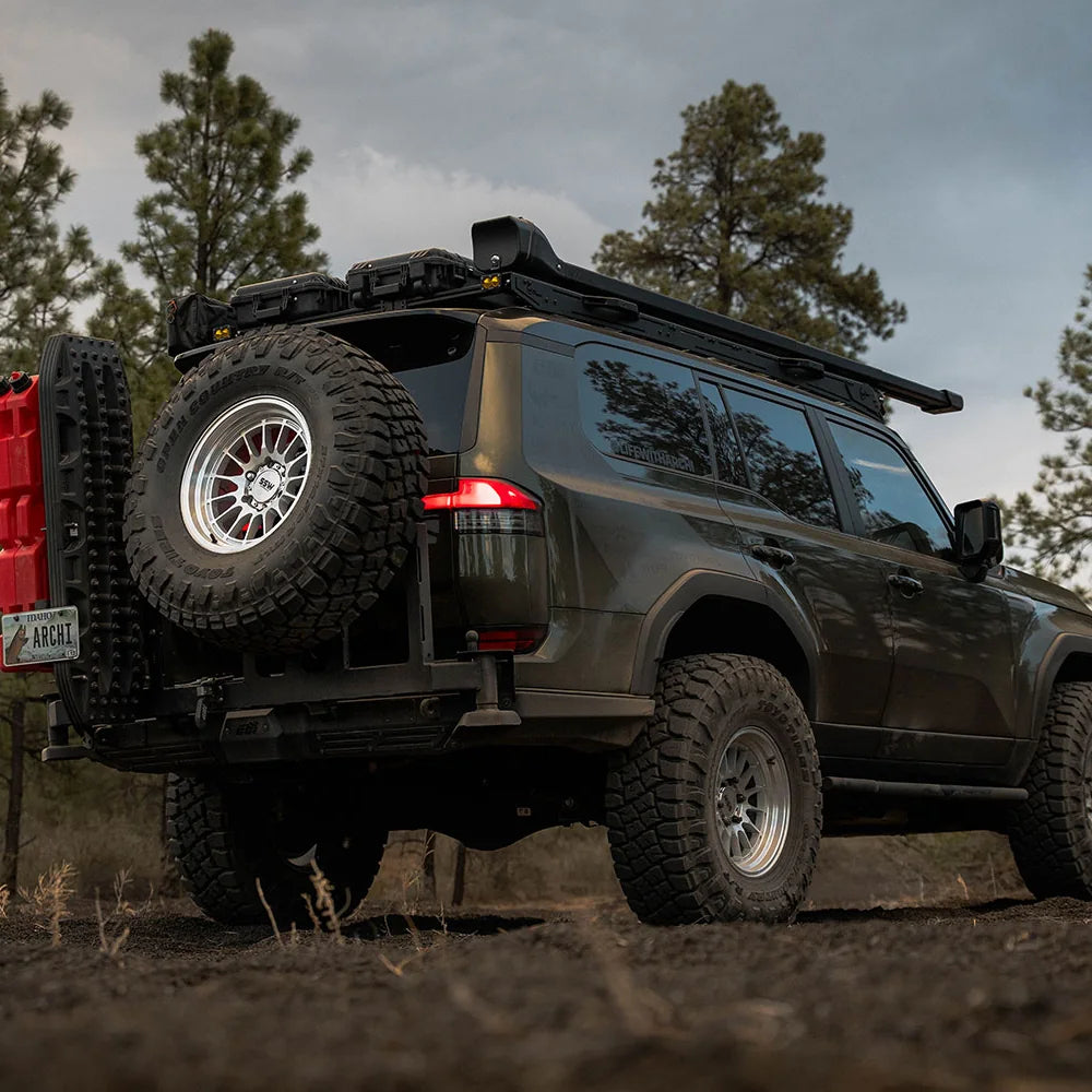 Lexus GX550 with CBI rear bumper on a forest trail