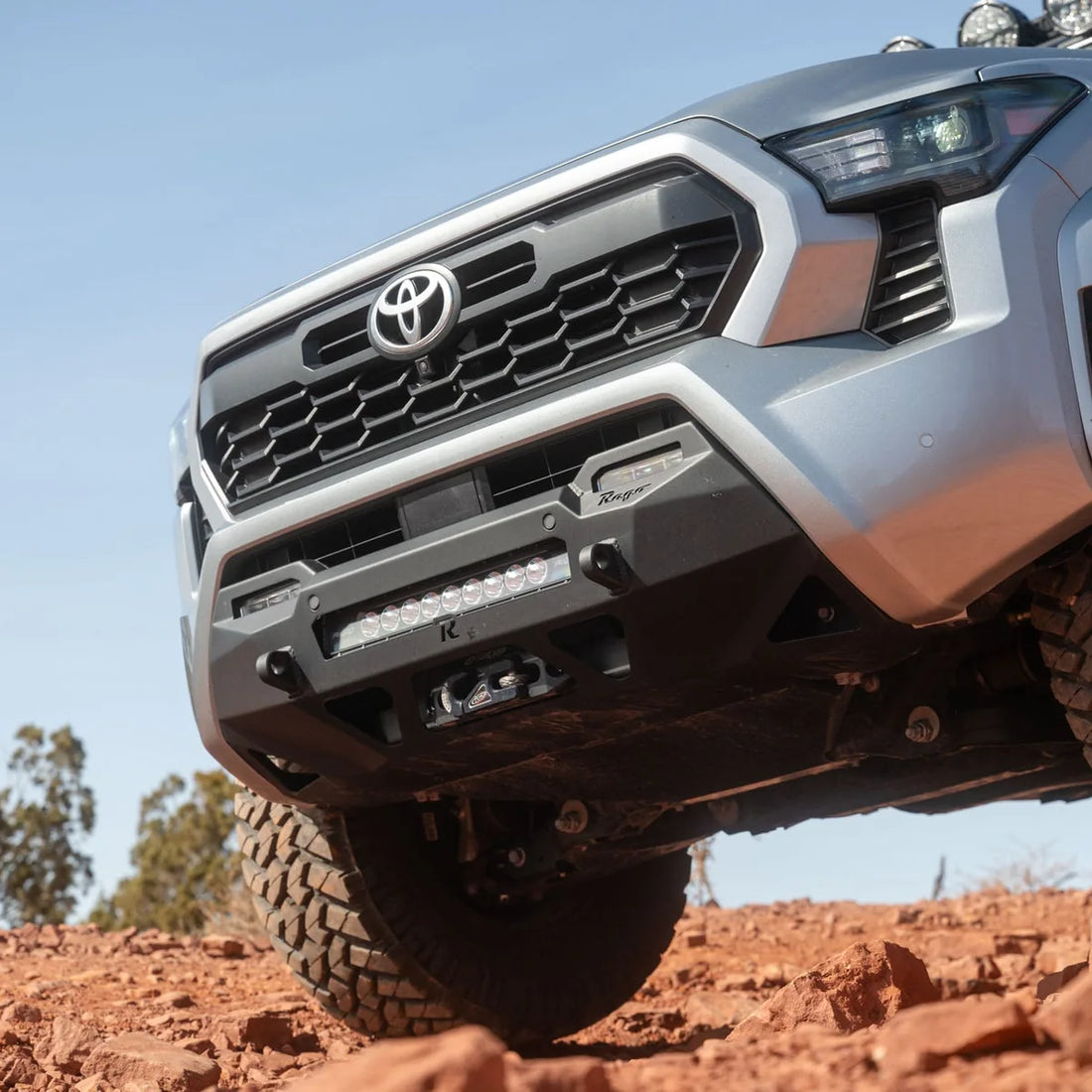 4th Gen Tacoma with Rago bumper and skid plate on red rock