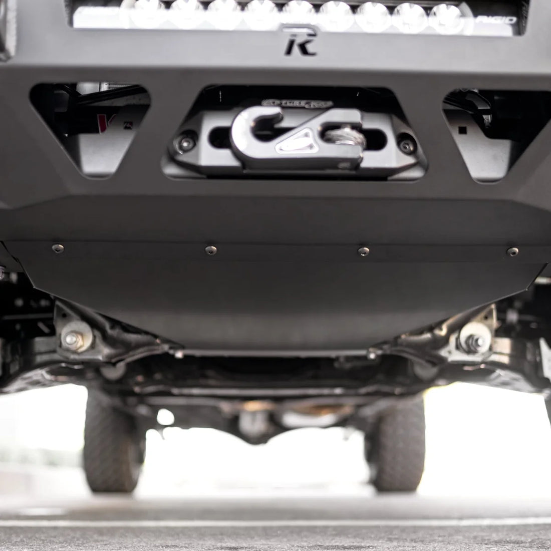 Underside view of the Rago Tacoma skid plate installed