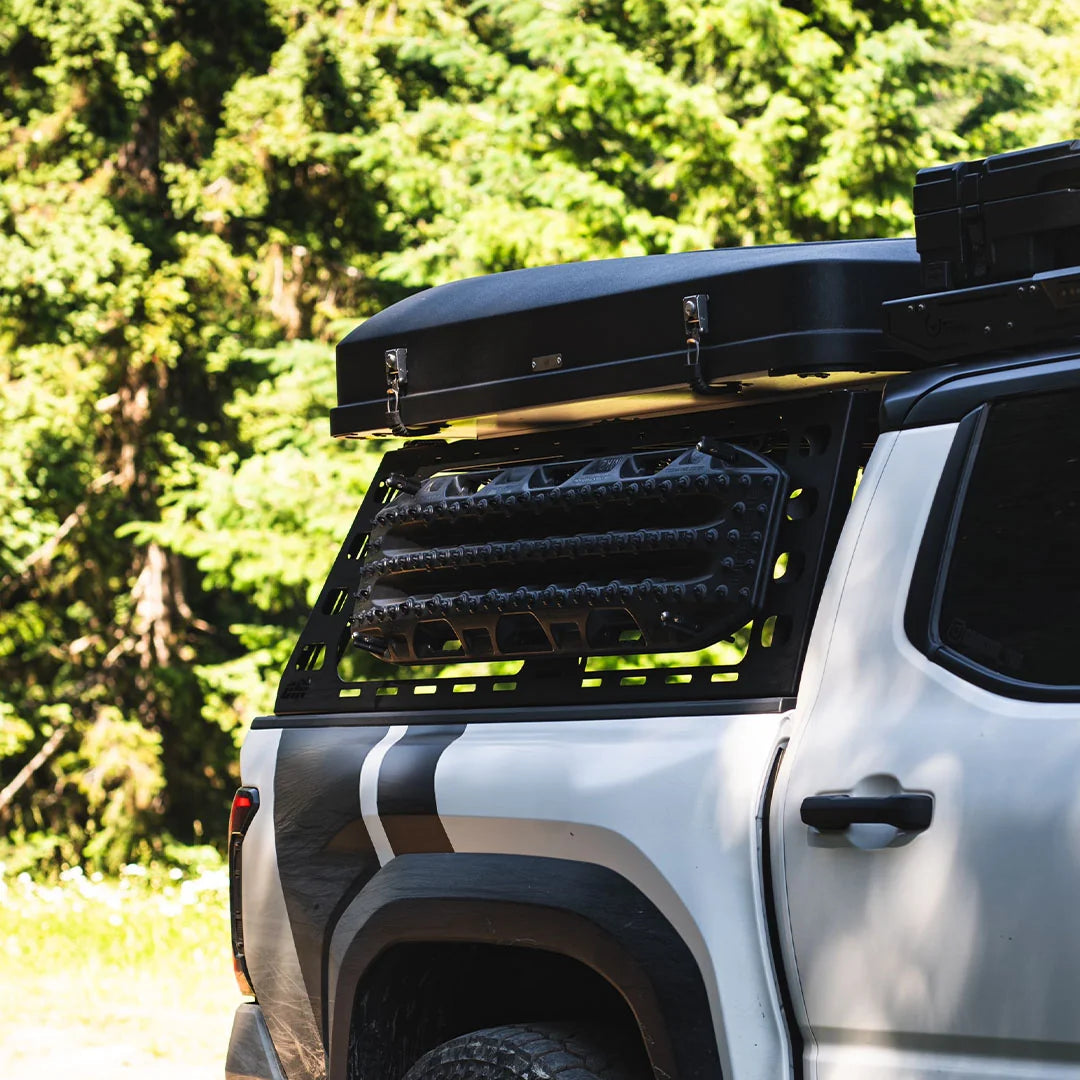 2024 Toyota Tacoma with CBI cab height bed rack and rooftop camper, side view