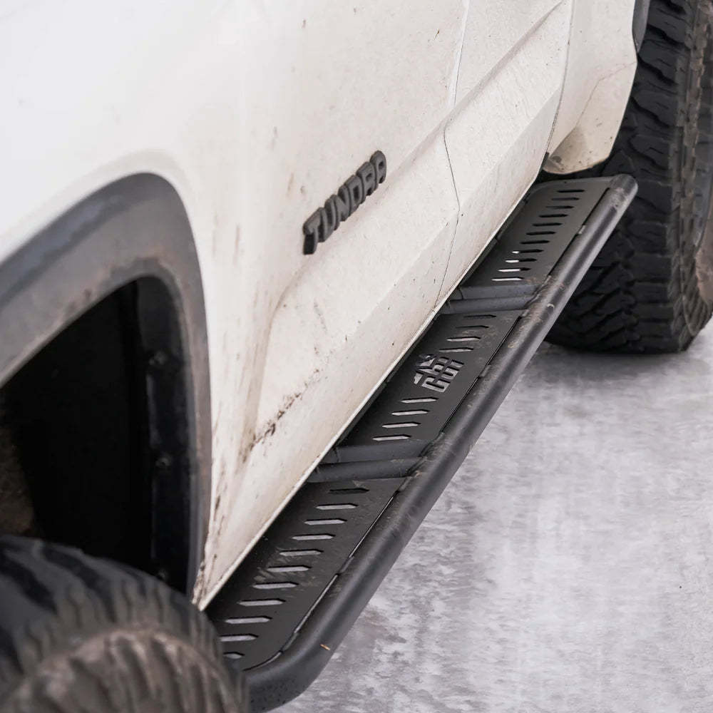 CBI rock slider on a white 3rd Gen Toyota Tundra