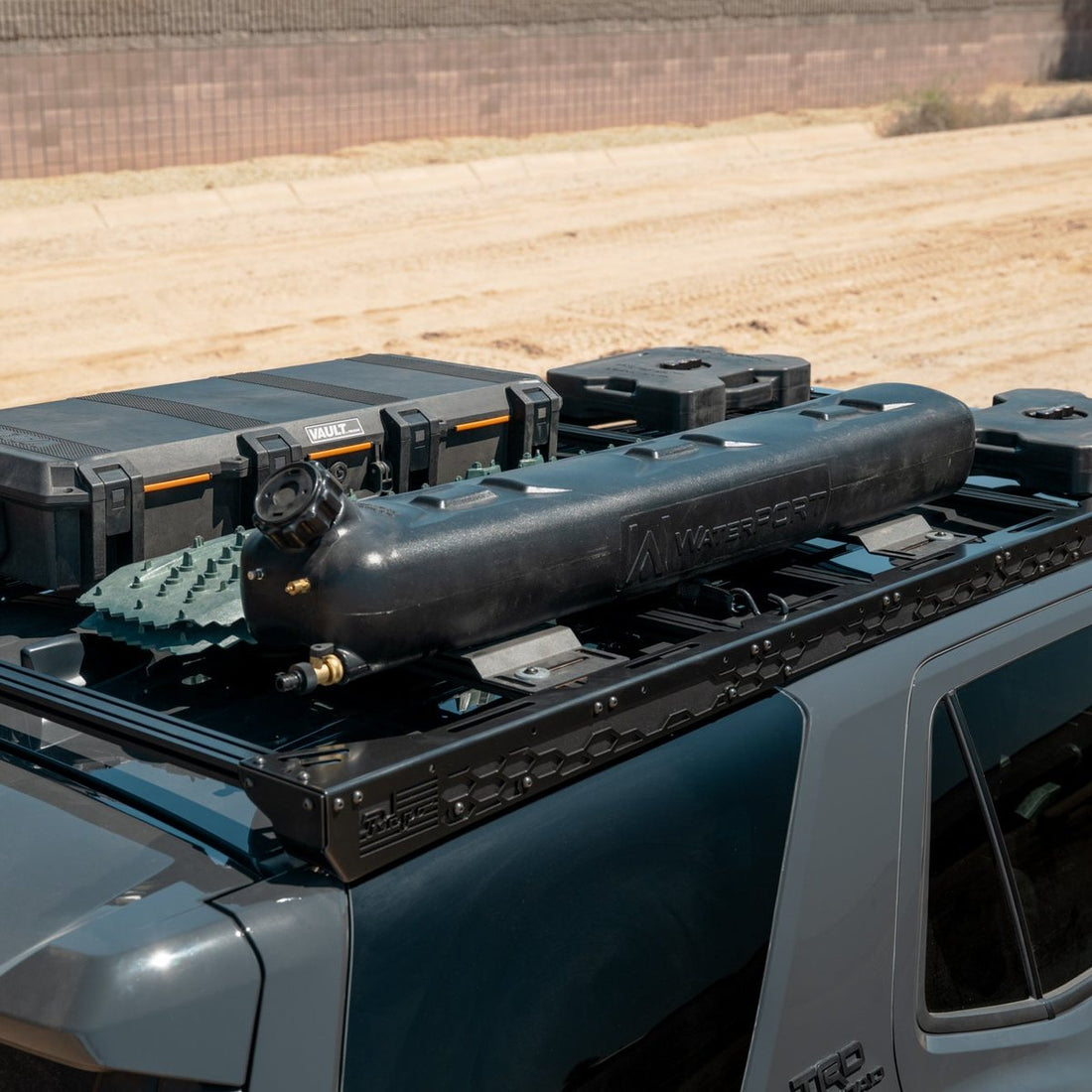 Rago 4Runner roof rack carrying cargo boxes and a water tank (gear not included)