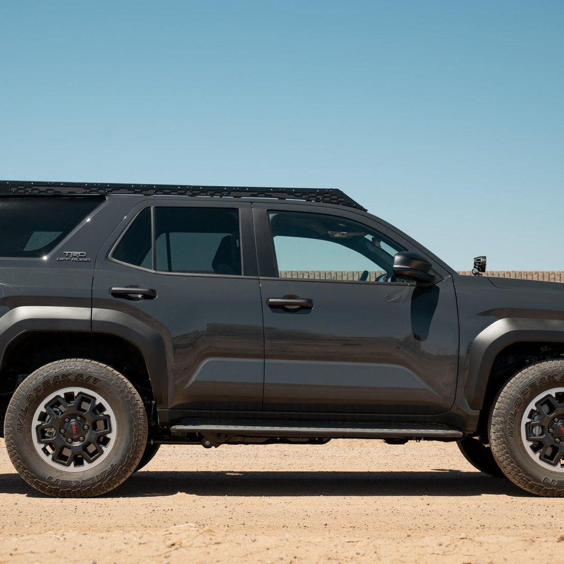 Gray 2025 Toyota 4Runner with the Rago low-profile roof rack, side view