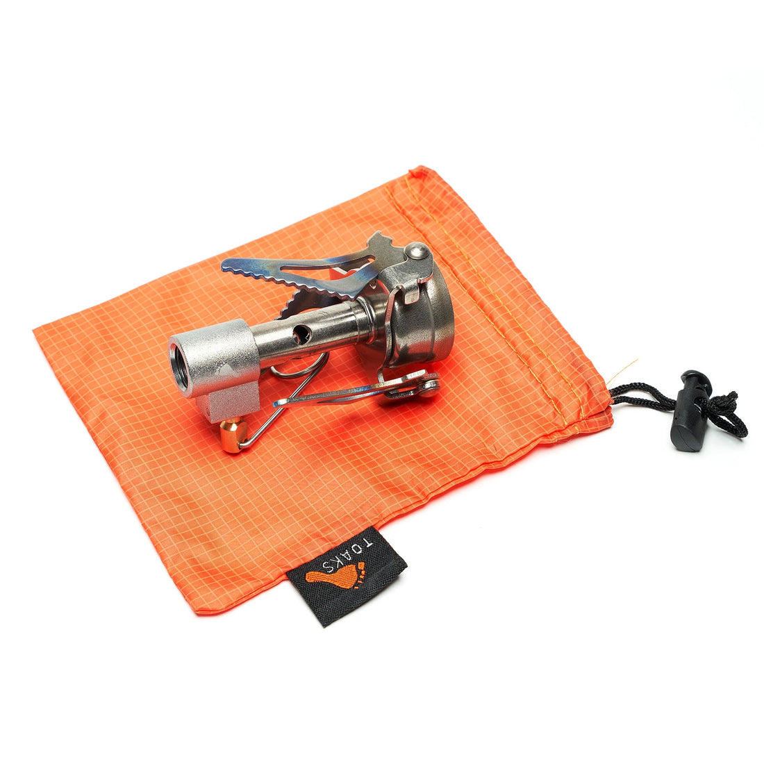 titanium stove in orange storage bag